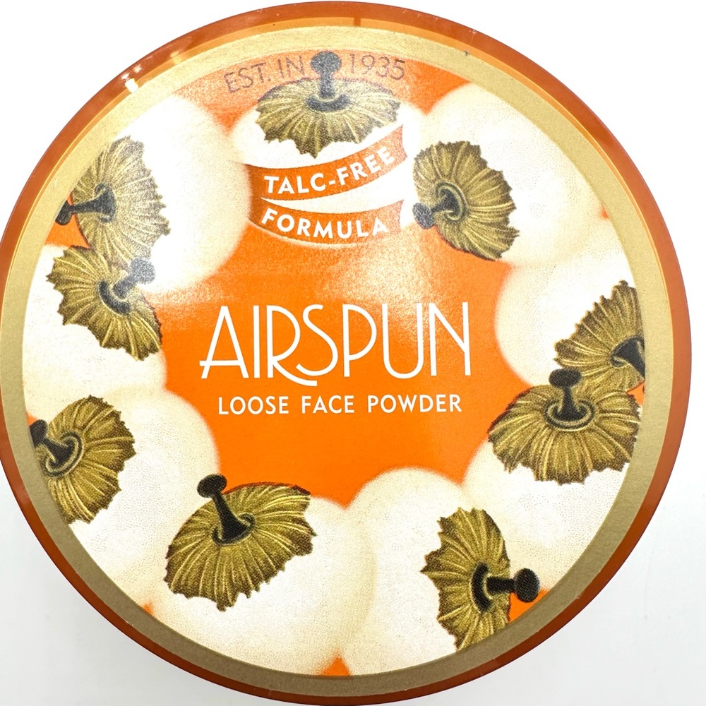 Airspun loose face powder  by Coty. Translucent